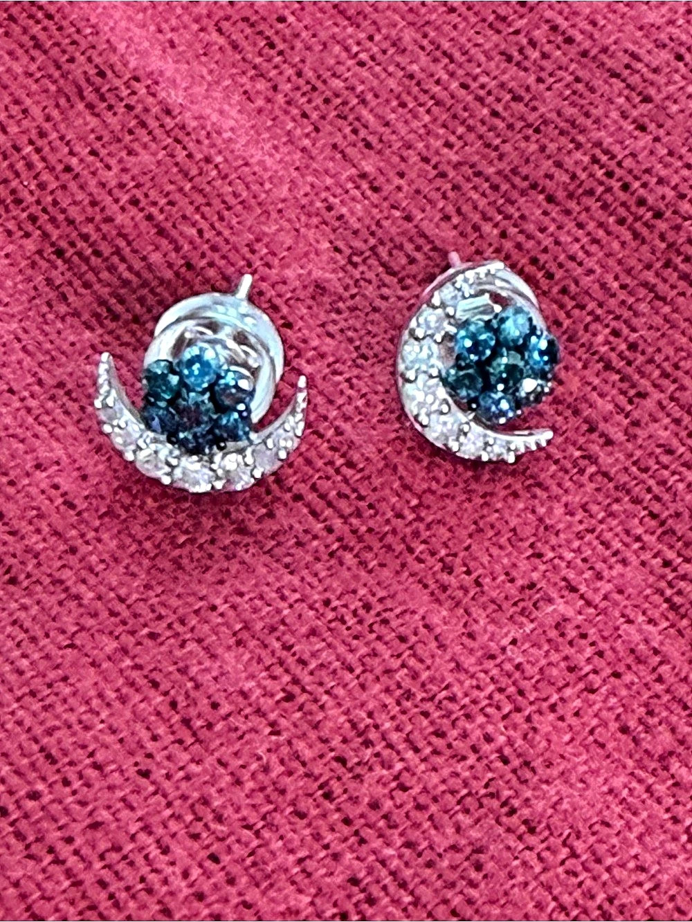 Blue Diamond Crescent stud earrings, 
.50 ct natural blue and white diamonds in